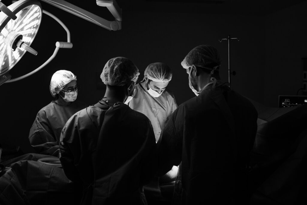 Doctors Performing a Surgery in the Operating Room in Medical tourism in India and Mexico